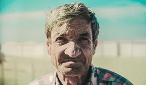 Old Man Frown In The Sunlight Wallpaper