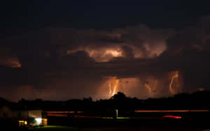 Ominous Thunderous Skies During Storm Wallpaper