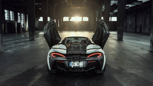 Open-doored Mclaren Spyder 570s Wallpaper