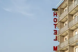 Opposite Hotel Signage Wallpaper