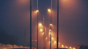 Orange City Pole Lights Wallpaper