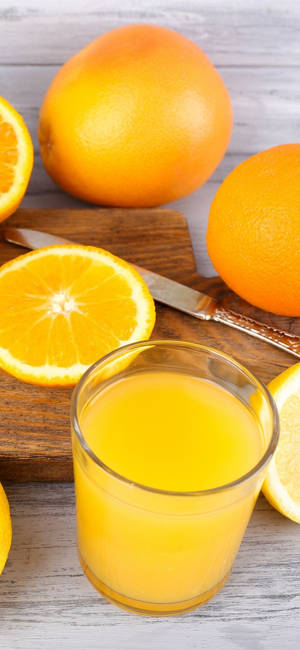 Orange Juice And Slices Wallpaper
