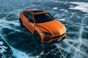 Orange Lambo Truck Wallpaper