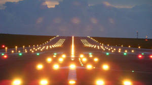 Orange Lights On Runway Wallpaper