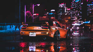 Orange Rx7 With Rain Drops Wallpaper