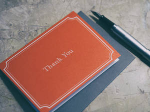 Orange Thank You Notebook Wallpaper