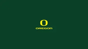 Oregon Ducks Football Team In Action Wallpaper
