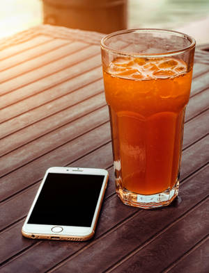 Original Iphone 6 And Orange Juice Wallpaper