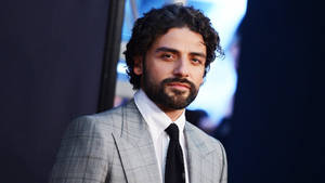 Oscar Isaac Elegant Suit Wallpaper