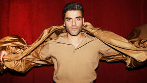 Oscar Isaac Waving Jacket Wallpaper