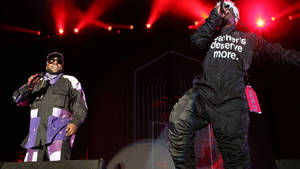 Outkast Duo Andre 3000 And Big Boi Performing At The Atlast Weekend Concert. Wallpaper