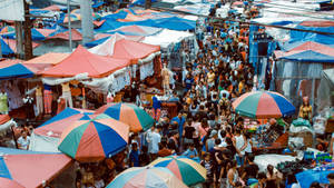 Overhead View Of A Vibrant Marketplace Wallpaper