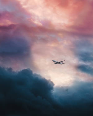 Overhead View Of An Airplane In Flight Wallpaper