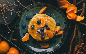 Pancakes With Berries And Oranges Wallpaper
