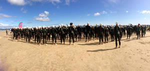 Panoramic Shot Of Triathlon Athletes Wallpaper