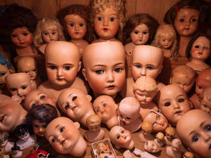 Paranormal Spooky Doll Collection Wallpaper