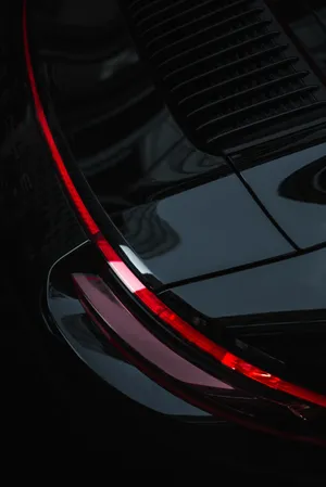 Partial Red And Black Porsche Wallpaper