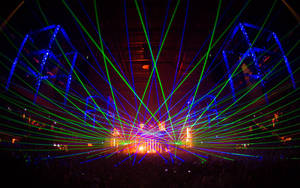 Party With Vibrant Laser Lights Wallpaper