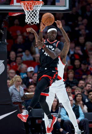 Pascal Siakam Passing The Ball Wallpaper