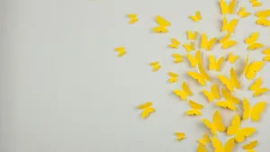 Pastel Yellow Paper Butterflies Wallpaper