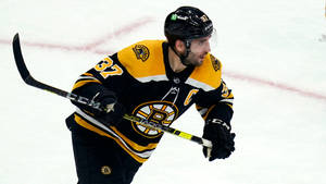 Patrice Bergeron Black Ice Hockey Uniform Wallpaper