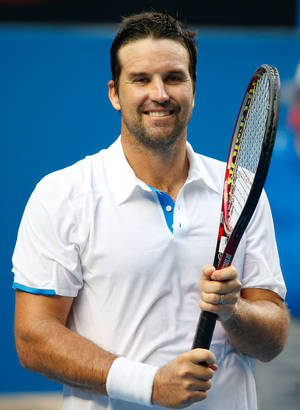 Patrick Rafter Smiling Holding Racket Wallpaper