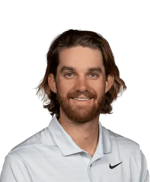 Patrick Rodgers In Full Swing On The Golf Course Wallpaper