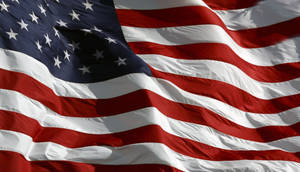 Patriotic Flying Flag Wallpaper