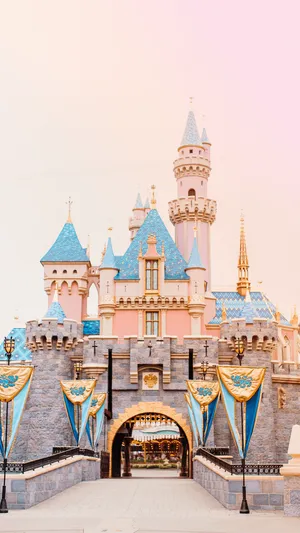 Peach-colored Disney Castle Wallpaper