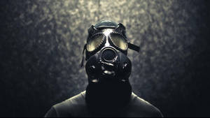 Peculiar Man In Full Gas Mask Wallpaper