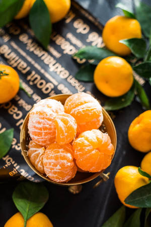 Peeled Citrus Fruit Clementine Overhead View Wallpaper