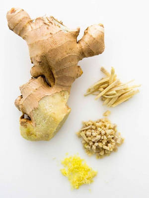 Peeled Sliced Chopped And Minced Ginger Root Wallpaper