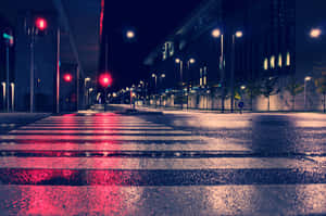 People Walking Down A Busy City Street Wallpaper