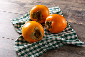 Persimmon Spread On Table Wallpaper