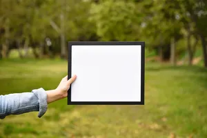 Person Holding White And Black Panel Wallpaper