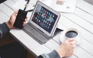 Person's Mobile Devices Technology Wallpaper
