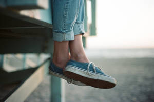 Person Wearing Authentic Blue Vans Wallpaper