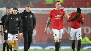 Phil Jones Walking With Team Wallpaper