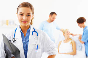 Physician Wearing A Laboratory Gown Wallpaper