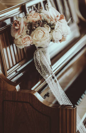 Piano With Hand Flower Bouquet Wallpaper