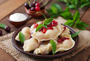 Pierogi And Red Cherries Wallpaper