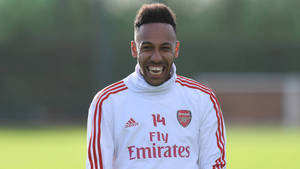 Pierre-emerick Aubameyang Smiling Widely Wallpaper