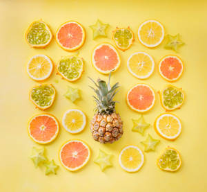 Pineapple And Sliced Citrus Wallpaper