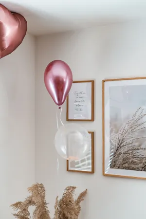 Pink Balloons And Frames At Bachelorette Party Wallpaper