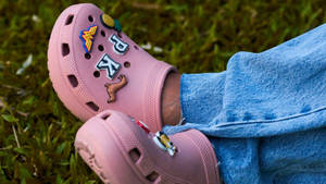 Pink Crocs Footwear With Jibbitz Wallpaper