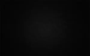 Plain Black Desktop With A Rough Texture Wallpaper