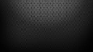Plain Black With Small Holes Wallpaper