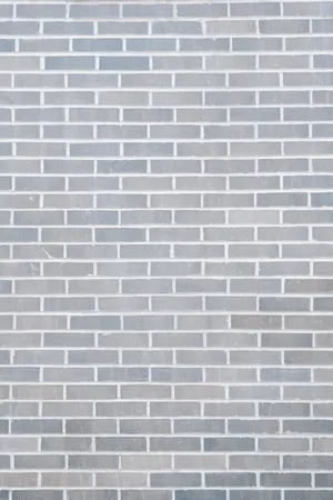 Plain Grey Brick Wall Portrait Wallpaper