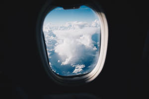 Plane Window Photo Of Cirrus Clouds Wallpaper