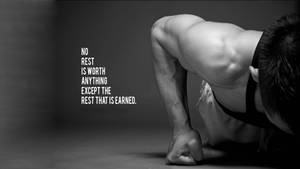 Planking Man With Fitness Quote Wallpaper